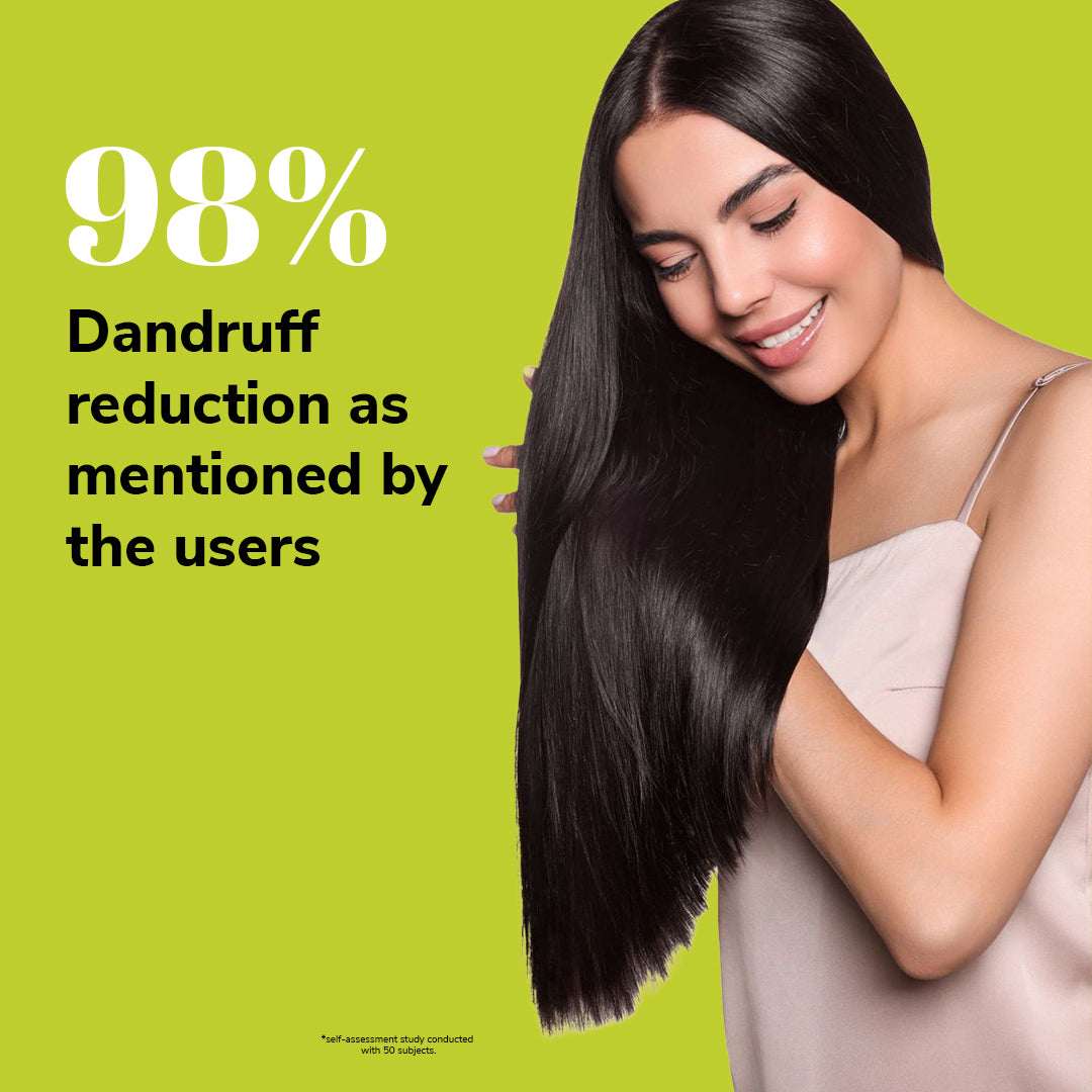 Woman with long, healthy hair on a green background with text about dandruff reduction.