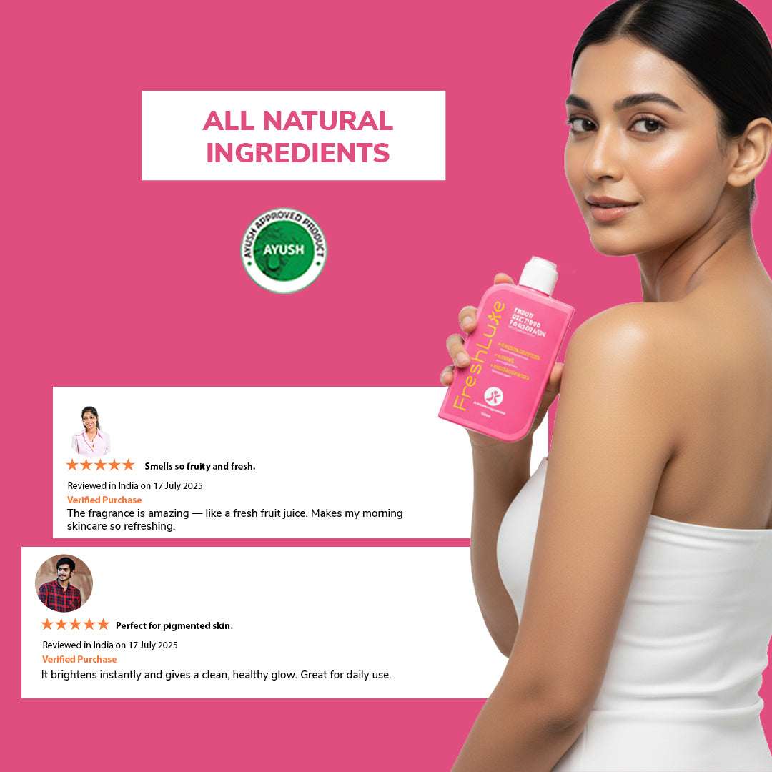 Woman holding a pink bottle with &