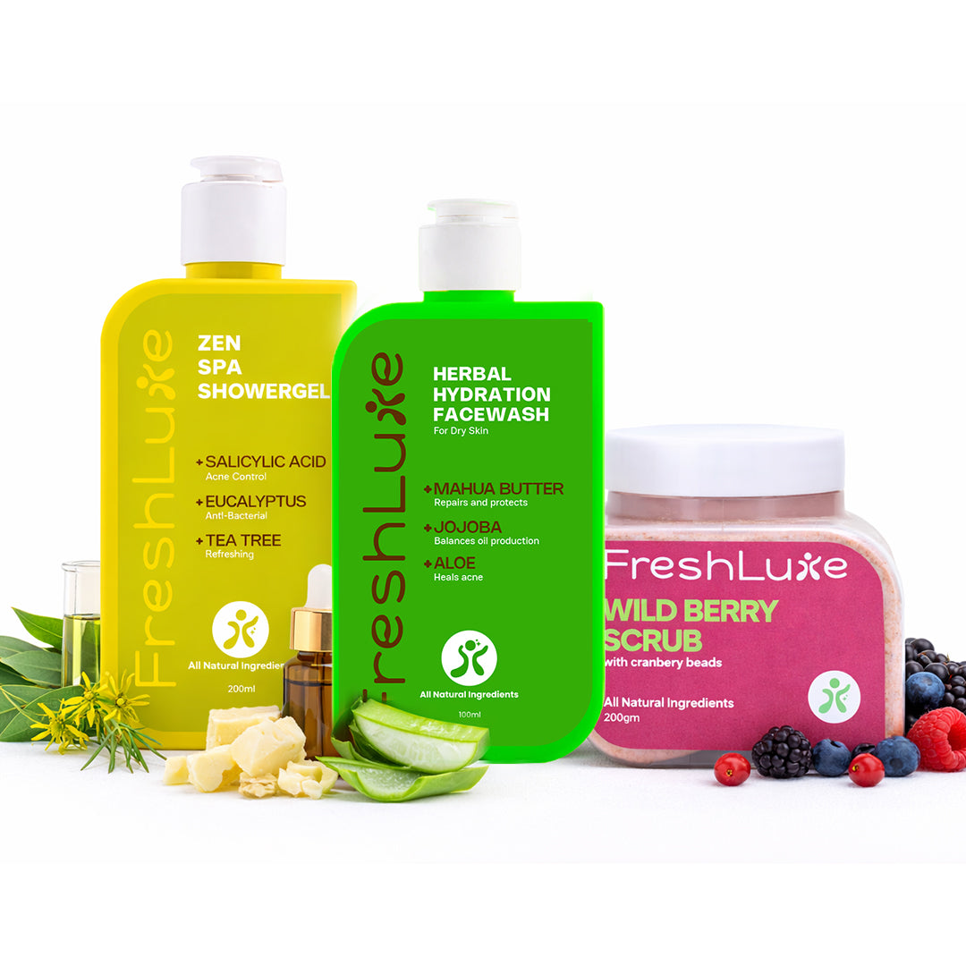 FreshLuxe skincare products including shower gel, face wash, and scrub on a white background.
