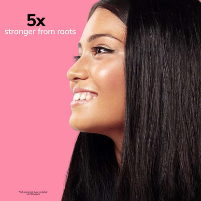 Woman with long dark hair against a pink background with text &