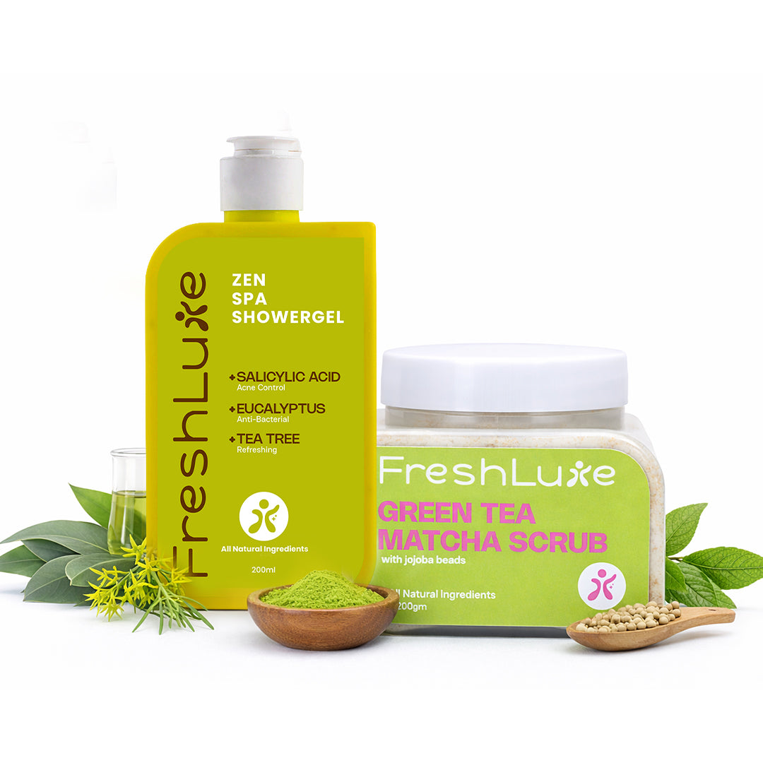 Two FreshLuxe skincare products on a white background with greenery.
